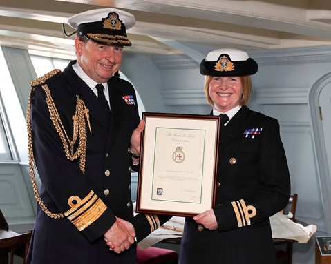 Cdr Jane Roe - seen here as a Lt Cdr being commended by then 2SL Jonathan Woodcock in 2017 - joint winner of the Outstanding Contribution Award