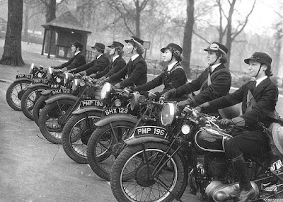 They looked capable... and attractive. Line of Wrens (WRNS) on motorcycles.